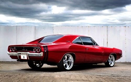 An American muscle car in candy apple red color