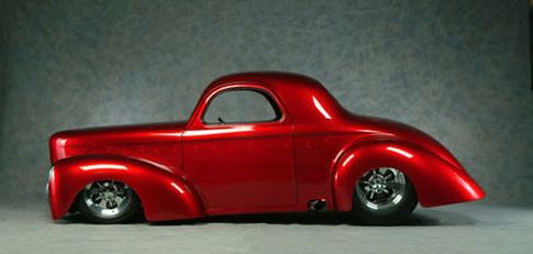 A Willys Coupe car in candy apple red color