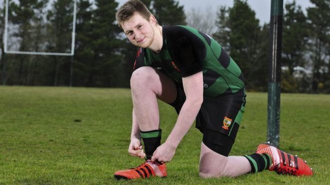 Carl Griffiths Rugby player Carl Griffiths gets size 21 boots after