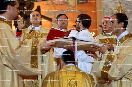 Carlo Chenis Cardinal Tarcisio Bertone attends a mass to ordain MsgrCarlo Chenis