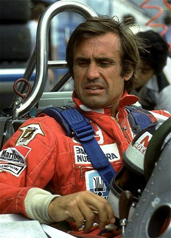 Carlos Reutemann wearing a red racing suit