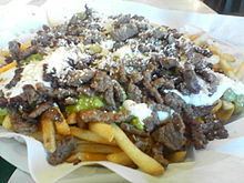 Carne asada fries httpsuploadwikimediaorgwikipediacommonsthu