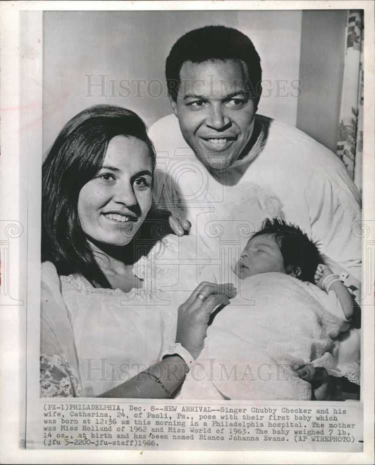 Chubby Checker and Catharina Lodders smiling together with their firstborn baby