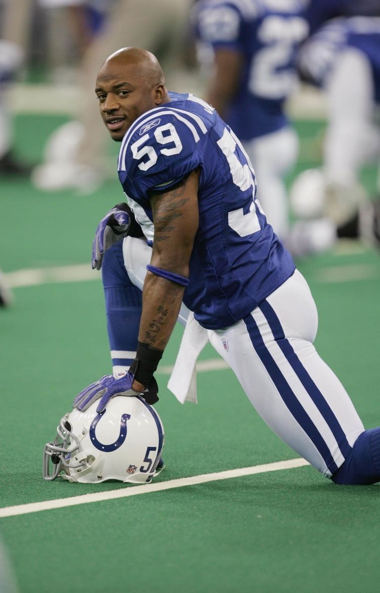 Cato June NFL Players Association Former Colts Linebacker Cato