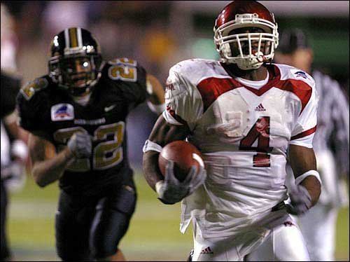 Cedric Cobbs Photo Arkansas tailback Cedric Cobbs sprints past