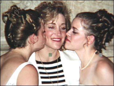 Jennifer and Kristina kissing their mother, Celeste Beard