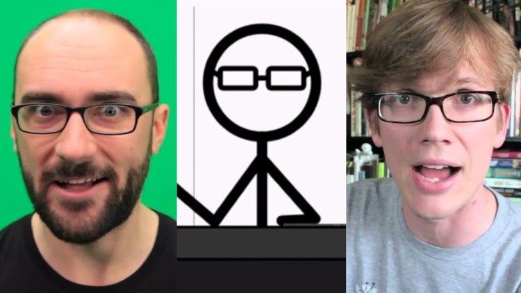 On the left, Michael Stevens wearing eyeglasses and a black shirt, CGP Grey at the center, and on the right, Hank Green wearing a gray shirt