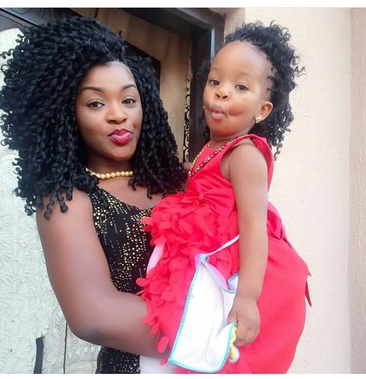 Chacha Eke Nollywood Actress Chacha Eke Kisses Her Cute Daughter On The Mouth