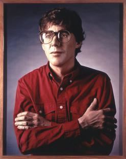 No, 1992, by Charles Ray. "No" consists of a framed picture of a fiberglass mold of Charles' head while looking afar, with a serious face and arms folded, wearing eyeglasses and a red long-sleeved shirt