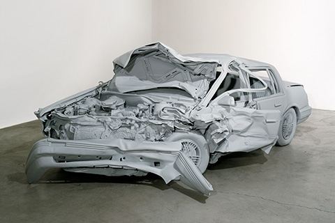Unpainted Sculpture, 1997, by Charles Ray. "Unpainted Sculpture" is a wrecked car