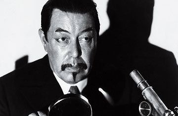 Charlie Chan Watching the Detective TIME