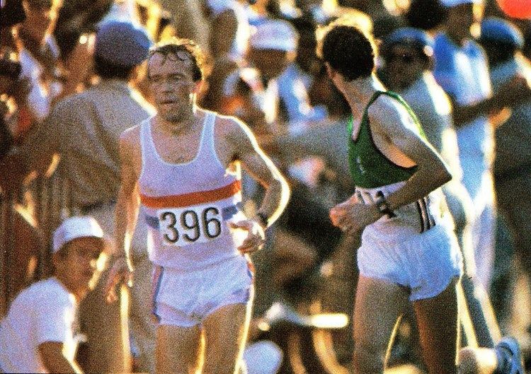 Charlie Spedding running ahead of John Treacy and wearing a shirt with the number 396 during the 1984 Olympics