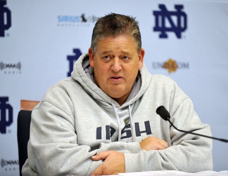 Charlie Weis Charlie Weis still collects millions from Notre Dame even though he