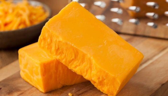 Cheddar cheese The history of cheddar cheese reflects the development of the US