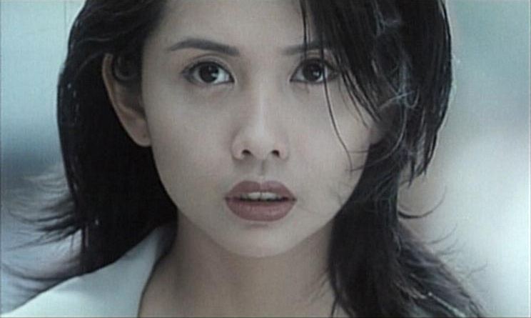 Chingmy Yau's serious face in a movie scene from 666 moh gwai fuk wut (1996 film)