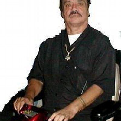 Rodrigo Ángel "Chito" Cano Rodríguez wearing black shirt, necklace and bracelet.