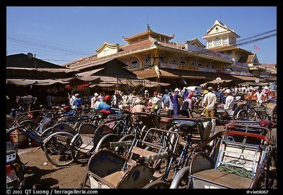 Cholon, Ho Chi Minh City PicturePhoto Cyclos wait outside the Bin Tay market in Cholon