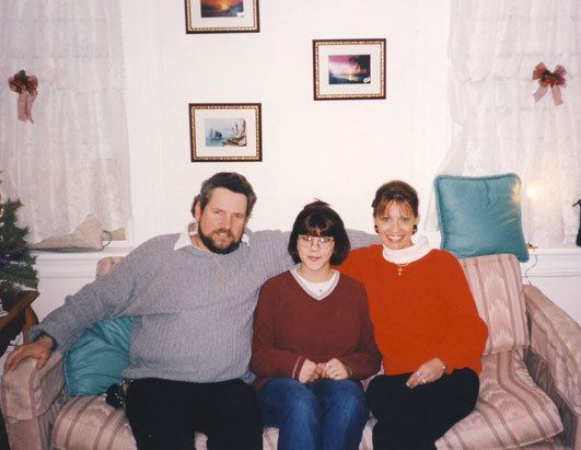 Christine Paolilla at home with stepfather Tom Dick, left, and Lori Paolilla, right, during her middle school years