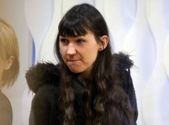 Christine Schürrer biting her lips while wearing a black fur jacket