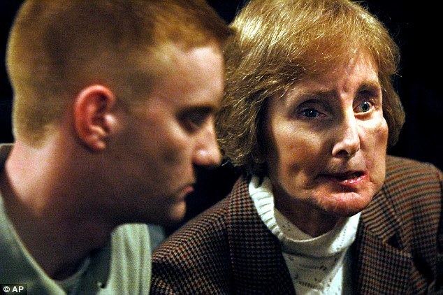 Christopher Porco with his mother Joan Porco wearing a white shirt.