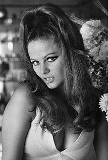 Claudia Cardinale with a fierce look and wavy hair