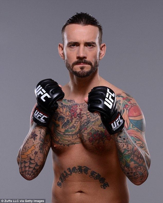 CM Punk CM Punk poses for UFC photoshoot after swapping WWE for