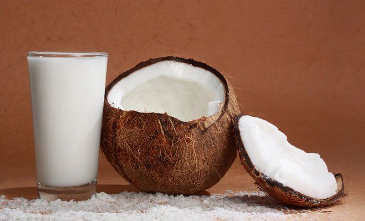 Coconut milk 9 Coconut Milk Nutritional Benefits Recipes Dr Axe