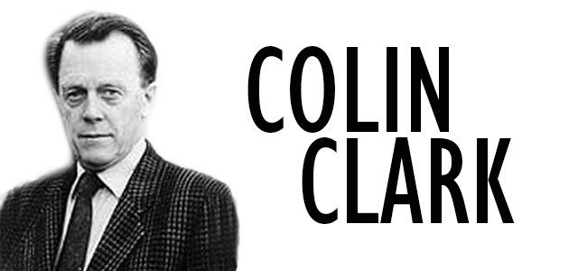 Colin Clark (filmmaker) wearing a shirt, a suit, and a tie