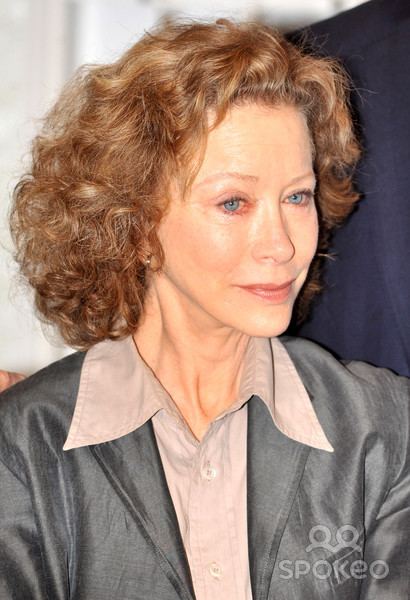 Smiling Connie Booth wearing a sleeve