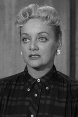 Connie Cezon wearing a checkered shirt while playing a blonde "gold digger" in several Three Stooges films
