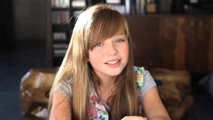Connie Talbot is singing live on GMTV song of Bob Marley- Three Little Birds  