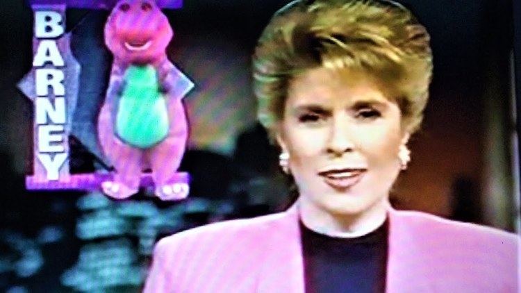 Cora-Ann Mihalik reporting on television about "Barney"