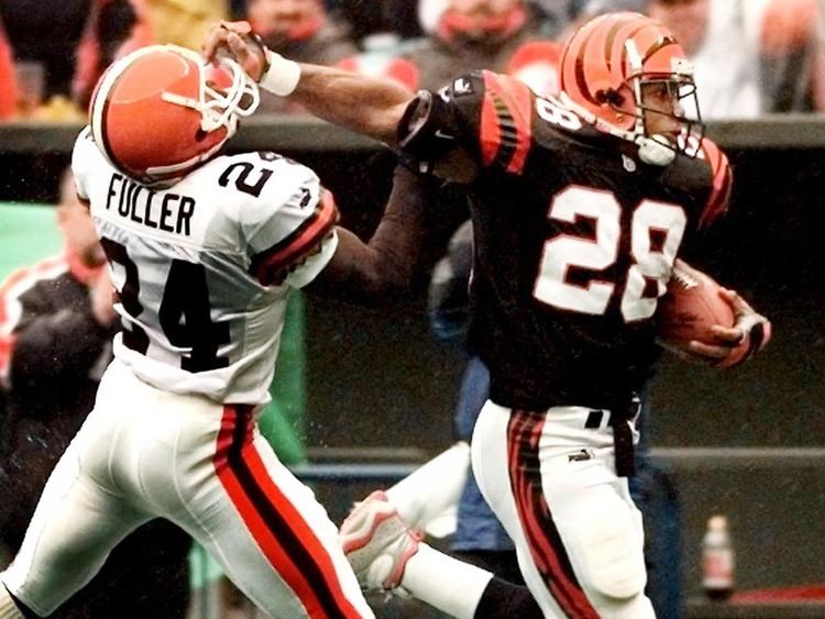 Corey Dillon Dillon39s straight arm punishes tacklers