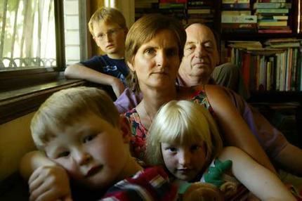 Cornelia Rau with short blonde hair together with her whole family.