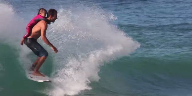 Cory Lopez Pro Surfer Cory Lopez Takes Daughter Piggyback Surfing Cuteness