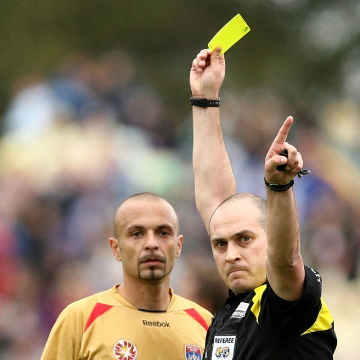 Craig Zetter Referee Craig Zetter shows Fabio Vignaroli a yellow card ABC News