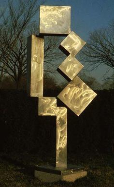 David Smith, Cubi XII", 1963 delineated space- forms carved out of space by positive forms