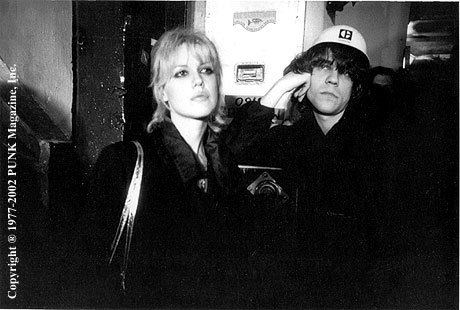 Cyrinda Foxe wearing black long sleeves & David Johansen looking afar while wearing black long sleeves