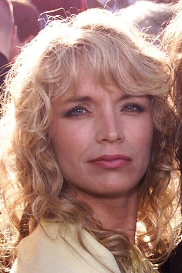 Cyrinda Foxe with blonde curly hair