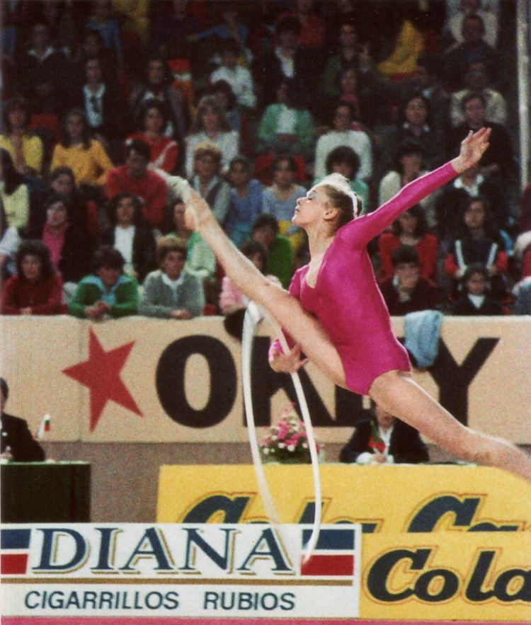Dalia Kutkaite wearing pink gymnastic leotard in her International Tournament