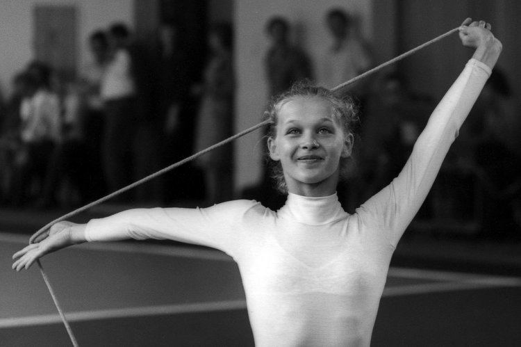 Dalia Kutkaitė wearing gymnastic leotard in her tournament