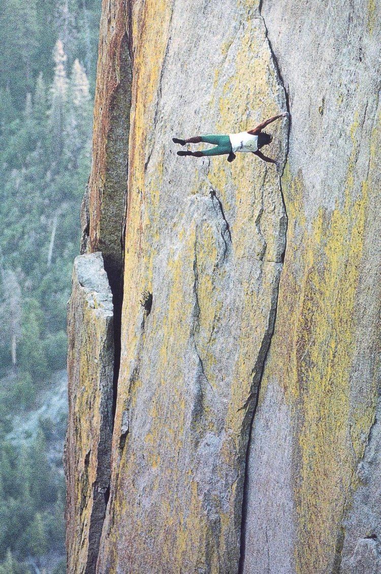 Dan Osman Dan Osman doing a human flag while free soloing climbing