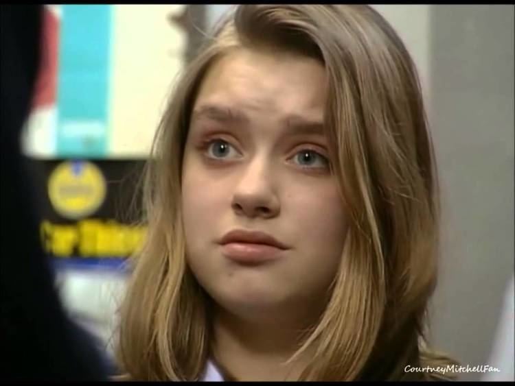 Daniela Denby-Ashe talking to the police officer in a scene from the 1994 television drama, The Bill