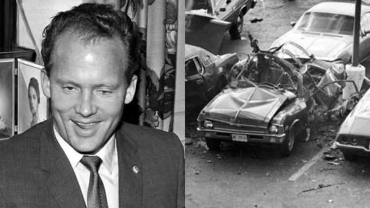 On the left, Danny Greene with a smiling face and wearing a suit and a tie. On the right, a smashed car.