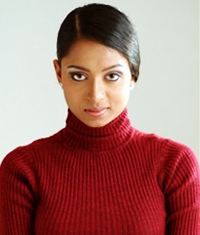 Dato Geethanjali wearing a red long-sleeved shirt