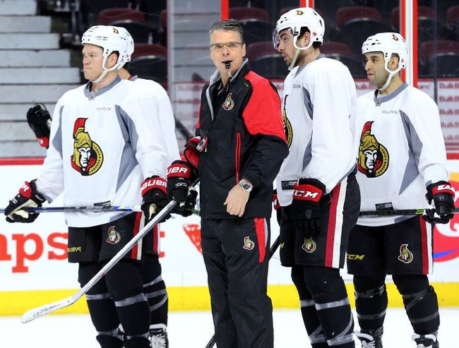 Dave Cameron (ice hockey) ExSenators coach Dave Cameron talking to Red Wings NHL Senators