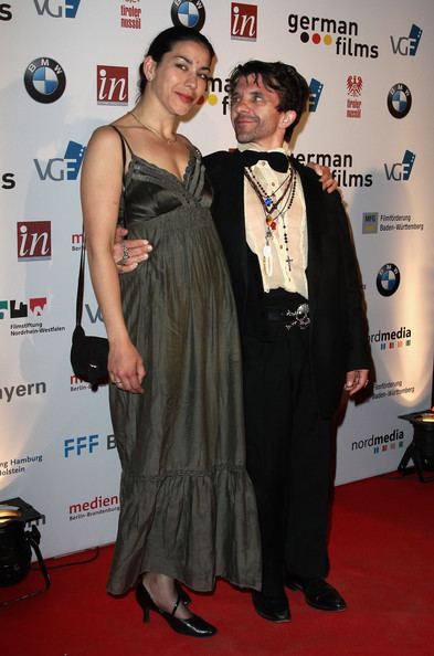 Kavita smiling while David Bennent looking at her while they are at the German Films Reception at Carlton Hotel during the 63rd Annual Cannes Film Festival