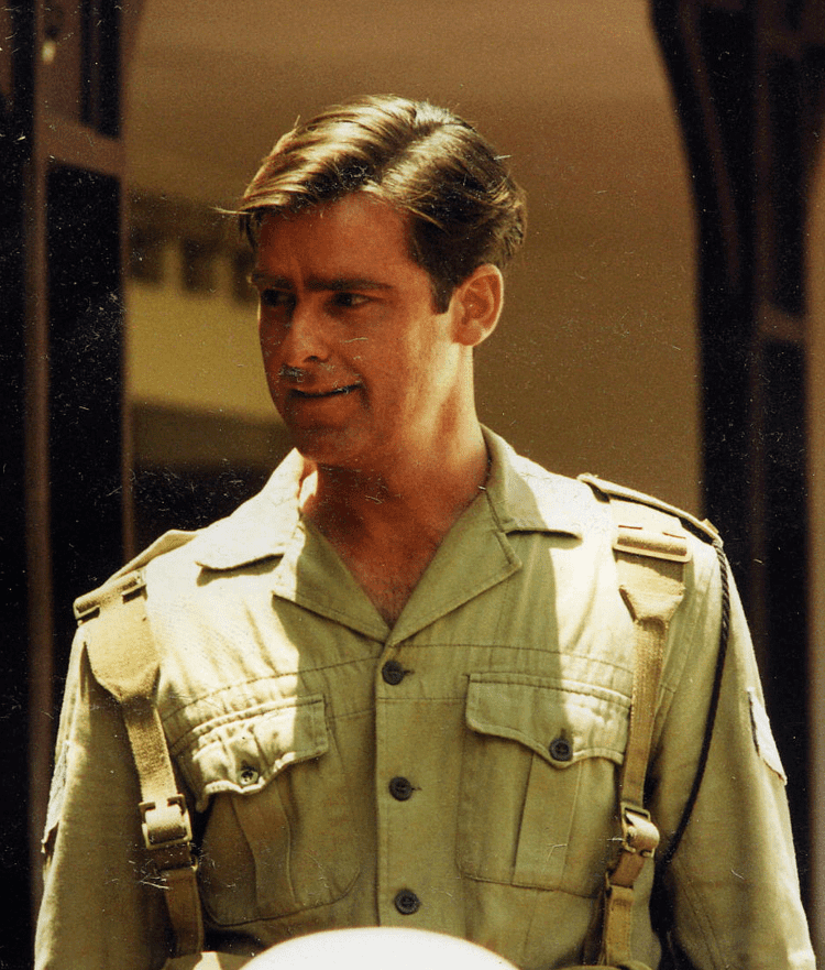 David Michaels smiling in a military uniform as Robert Green in the 2001 film "Nowhere in Africa"