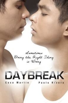 Coco Martin and Paolo Rivero looking at each other in a movie poster of 2018 indie film, Daybreak