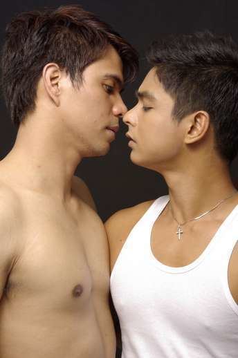 Coco Martin and Paolo Rivero looking at each other
